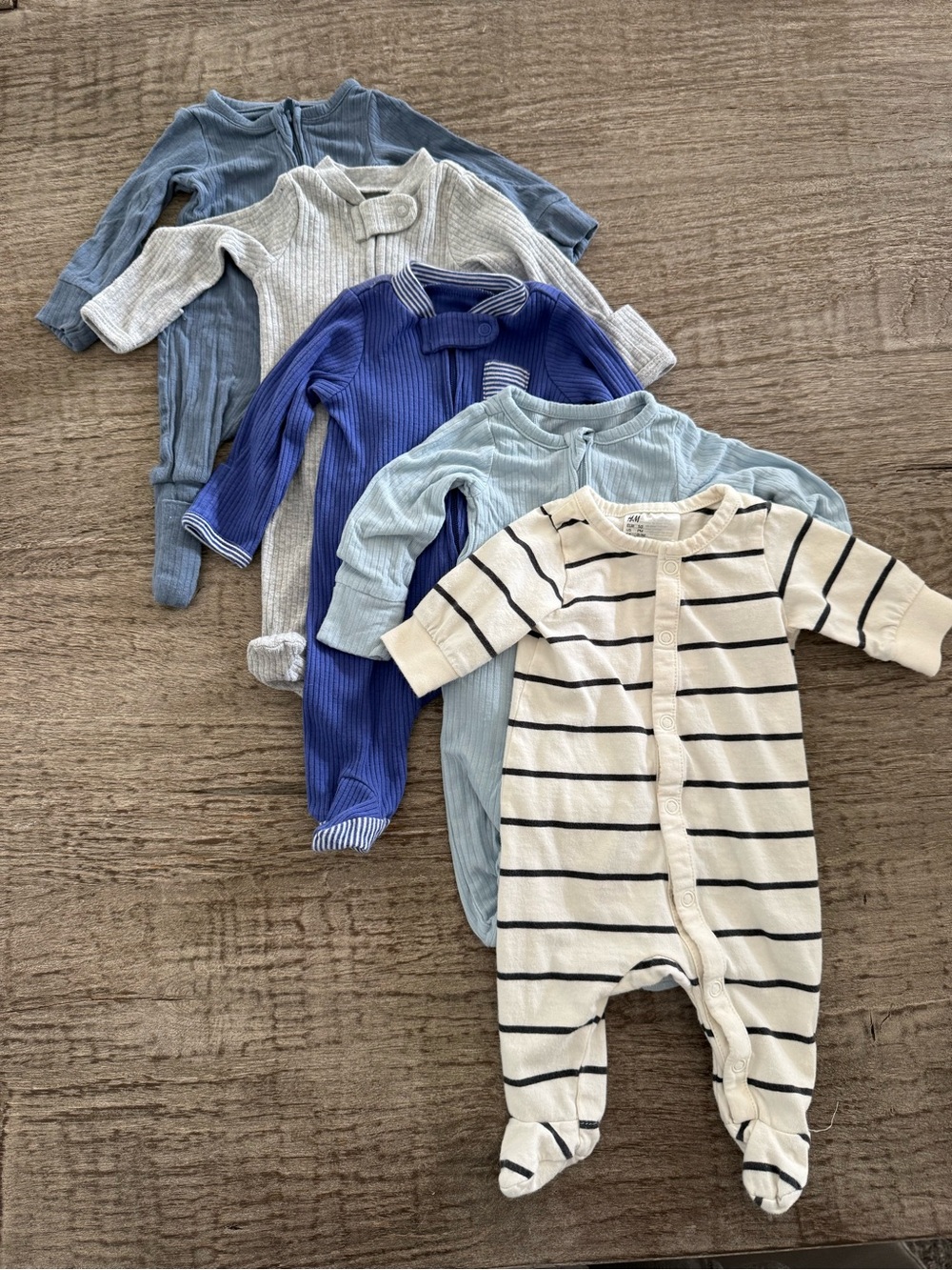 H & M and Carters preemie onesies sleepers outfits
